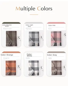 Multiple color options of vintage plaid scarves with fringes on a clean background