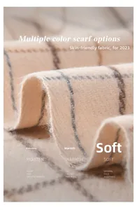Macro shot of plaid scarf showing soft skin-friendly fabric fibers and warm texture