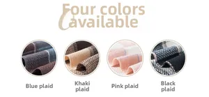 Detail of four color checkered patterns on soft thick cashmere-like scarves with fringe