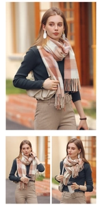 Close-up of color-block plaid scarf with elegant soft tassels and warm cashmere feel