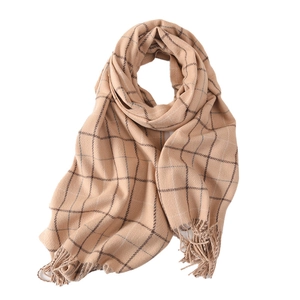 Classic camel and beige plaid scarf with tassels made of warm cashmere-like fabric