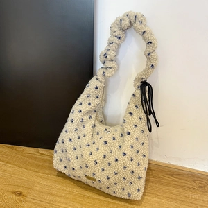 Winter fleece cream shoulder bag with blue star embroidery and drawstring closure