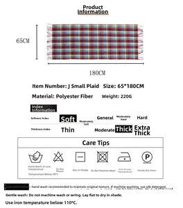 Detail view of plaid scarf with tassels, 65x180cm size and soft polyester texture specs