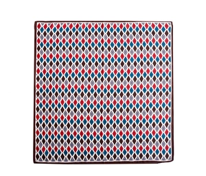 Flat lay detail of a square silk scarf with red, blue and brown argyle diamond pattern