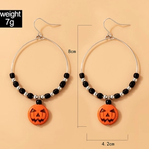Boucles d'oreilles citrouille d'Halloween avec perles noires et détails de taille