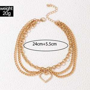 Detailed specs of triple-layered gold anklet with heart pendant and 20g weight