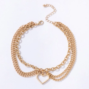 Three-layer gold chain anklet featuring heart and snake pendant charms for women