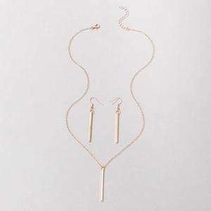 Detail of minimalist gold rectangular pendant necklace and matching drop earrings set