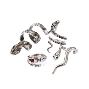 Exaggerated snake-shaped ring and earring set with colorful gemstones in silver finish