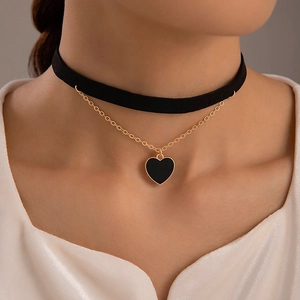 Double-layered black velvet choker with gold chain and black heart pendant for women