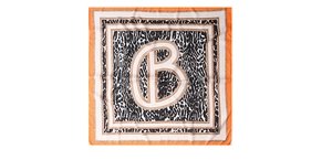 Detail of leopard print silk scarf with orange border and white chain pattern letter B