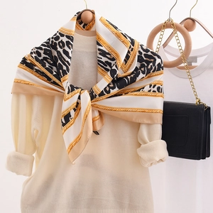 French retro leopard print silk scarf with gold chain pattern on knit sweater