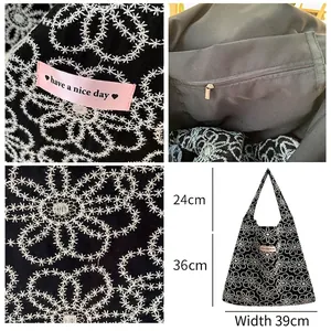 Grand sac cabas en toile brodé de fleurs avec étiquette rose Have a Nice Day stylée