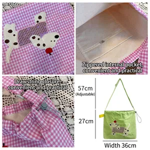 Sac bandoulière en toile à carreaux avec cordon de serrage et broderie animale