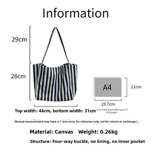 Detailed size chart for blue striped canvas tote bag showing dimensions and A4 capacity