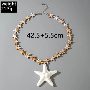 Detailed shot of starfish beaded necklace with 42.5cm plus 5.5cm chain length and 21.5g weight