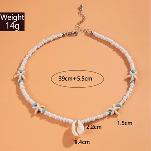 Flat lay of starfish necklace with dimensions, weight 14g, length 39cm plus 5.5cm extension