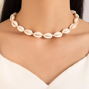Bohemian natural cowrie shell choker necklace for summer beach and vacation styling