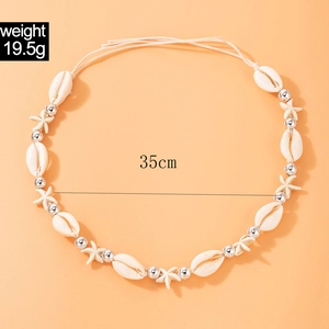 Detail view of beach shell necklace with starfish beads, weighing 19.5g and 35cm length