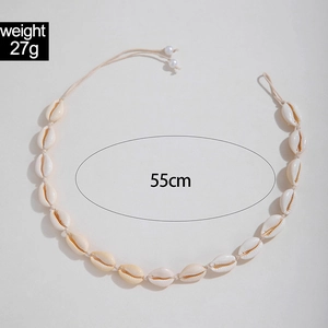 Detail of bohemian seashell necklace with 55cm length and adjustable pearl drawstring