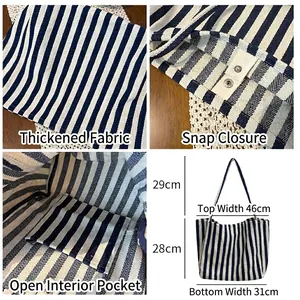 Large capacity blue striped canvas tote bag with metal buckle and interior pocket detail