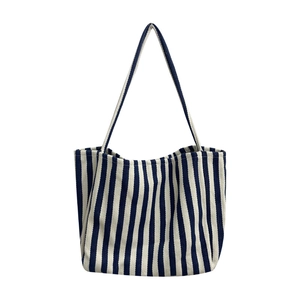 Large capacity canvas tote bag with blue and white stripes for daily commuting style