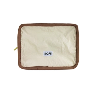 Portable beige storage bag with Hope label and brown trim for travel organization