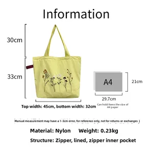 Detailed dimension guide for yellow nylon tote bag featuring floral embroidery and A4 capacity