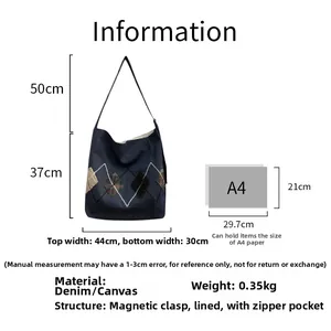 Detailed view of denim tote bag with diamond pattern, magnetic clasp and inner pockets