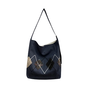 Fashionable denim canvas tote bag with argyle patchwork design and wide shoulder strap