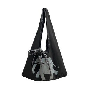 Black canvas tote bag featuring a gray elephant print and stylish plaid ribbon bow detail