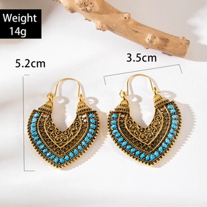 Detail view of Bohemian heart earrings with blue beads showing 5.2cm height scale