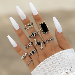 Set di 9 anelli vintage boho in argento con pietre nere, piume, serpente e motivi a corona