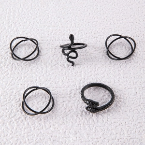Detailed view of 5-piece punk black metal snake and crossover geometric ring set