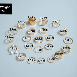 Detailed size and weight specifications for the 20-piece gold pearl ring set