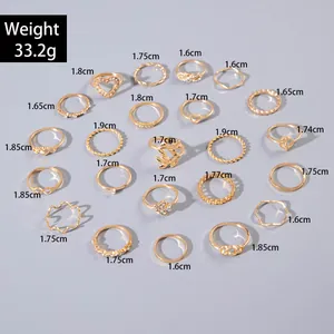 Size chart showing inner diameters and weight for a 22-piece gold ring set