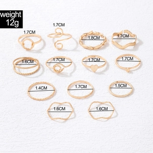 Detailed size chart for a 12-piece gold butterfly and heart knuckle ring set