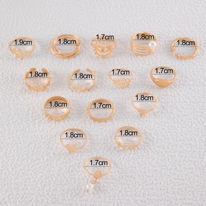 15-piece gold butterfly and heart ring set shown with detailed diameter measurements