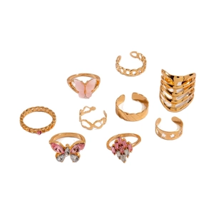 9-piece gold-toned ring set featuring pink butterflies, crystals, and hollow heart designs