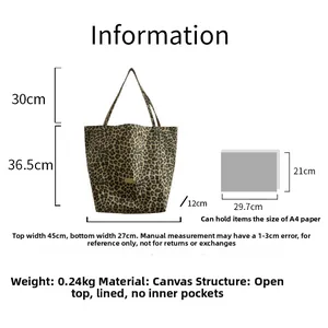 Detailed dimension guide for leopard print canvas tote bag showing A4 size comparison