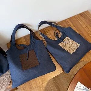 Denim tote bags featuring leopard print patchwork pockets and spacious casual design