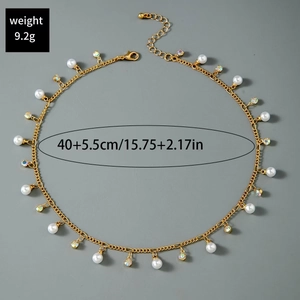 Detail of a gold clavicle chain with white faux pearl, rhinestones, and 9.2g weight mark
