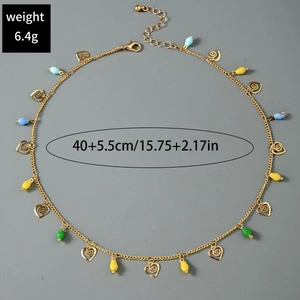 Detail of French vintage gold necklace with colorful beads and heart charms showing size specs