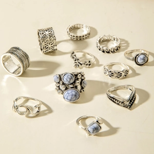 Detailed set of bohemian silver rings featuring vintage floral and ethnic carvings