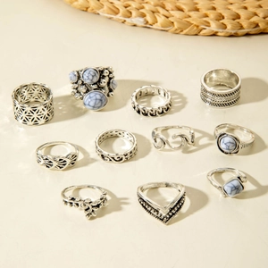 Detailed view of 11-piece vintage bohemian silver rings with marble stone inlays