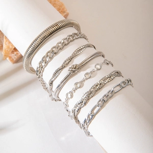 Detail view of 7-piece silver geometric bracelet set with rhinestones and chain links