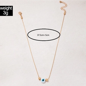 Detail of evil eye pendant necklace showing 3g weight and 37.5cm adjustable chain length