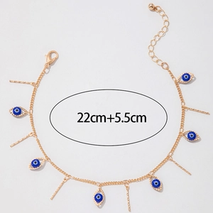 Gold evil eye anklet with vertical bar charms and detailed 22cm plus 5.5cm measurements
