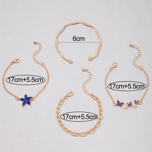 Détail des breloques papillon bleu et du bracelet doré de 6 cm avec dimensions précises