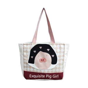 White canvas lunch bag with pink handle and cute Exquisite Pig Girl cartoon print